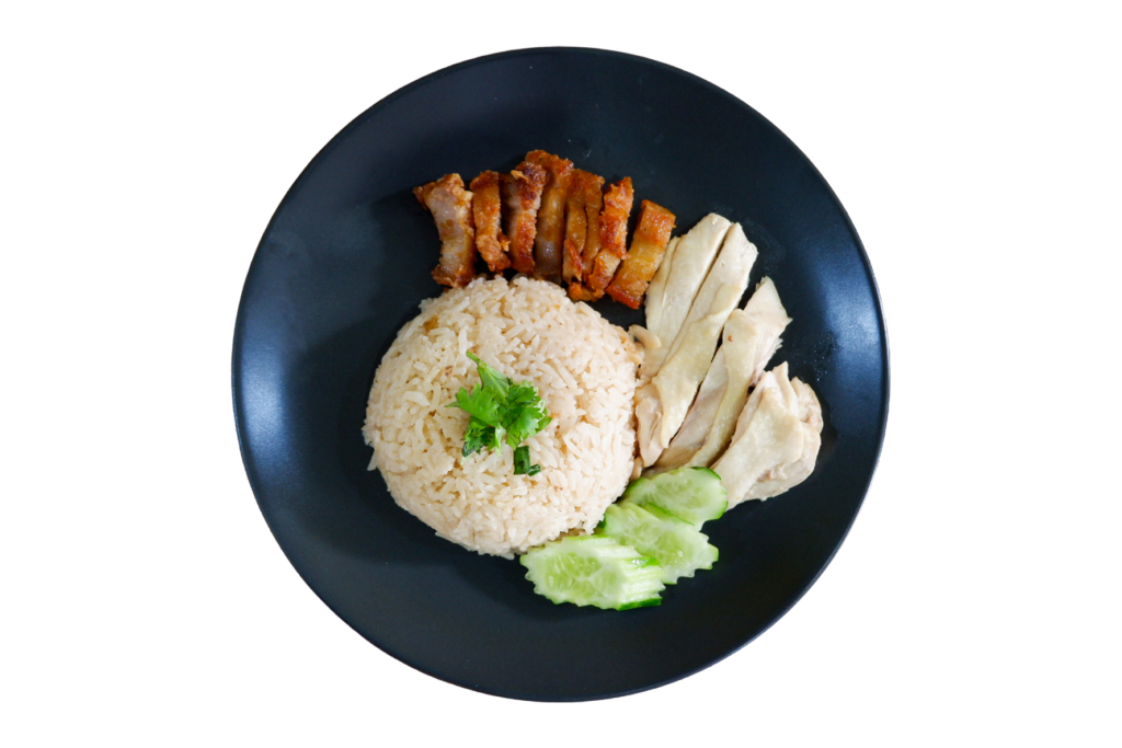 Plate of rice with roasted and steamed chicken
